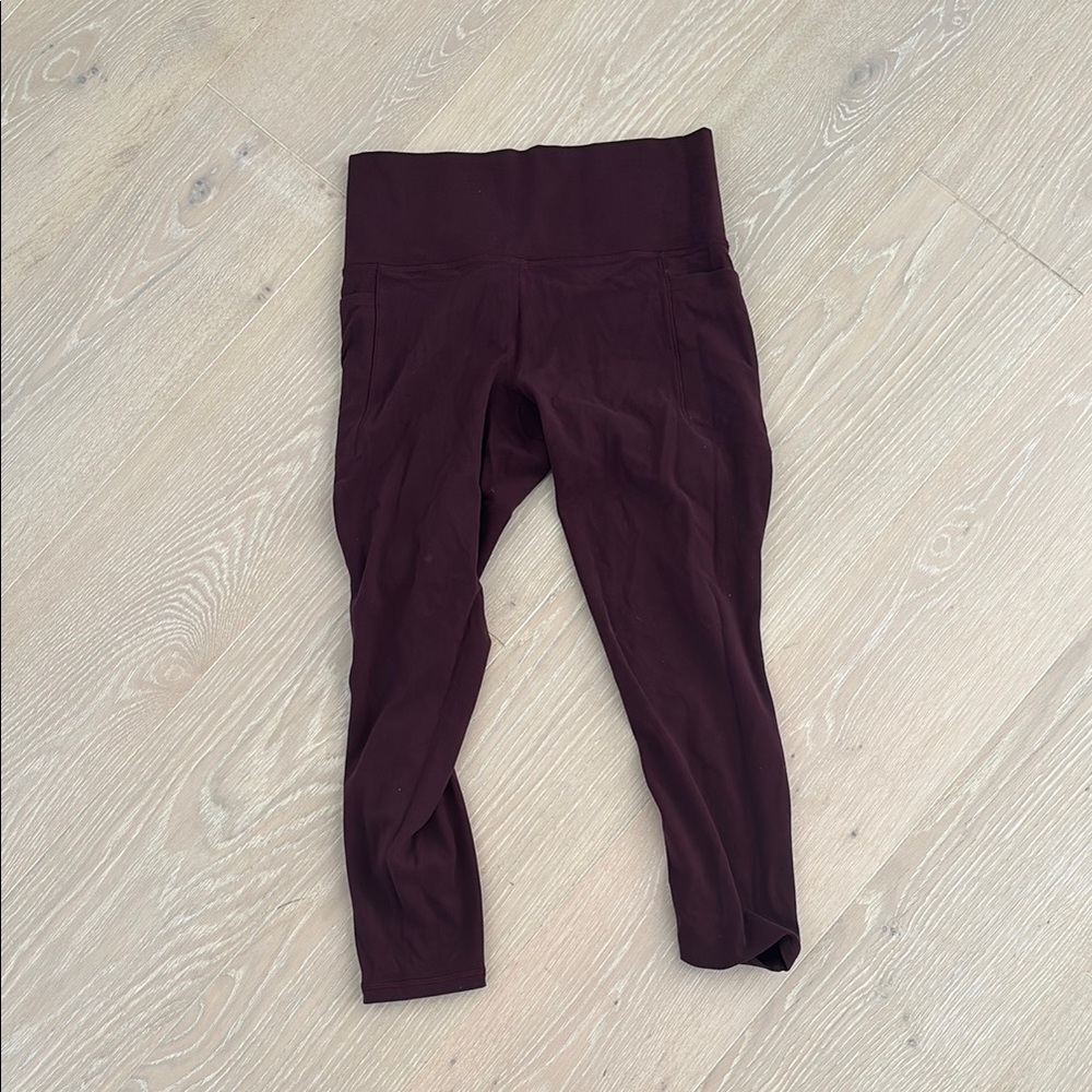 Athleta salutation stash pocket II 7/8 tights Maroon